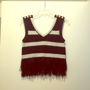 V neck sleeveless club Monaco sweater w fringe